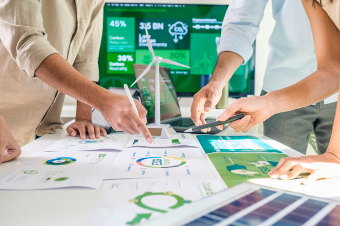 diversity team discussion focused on ESG (environment,social,governance) for net zero goals in a sustainable green office
